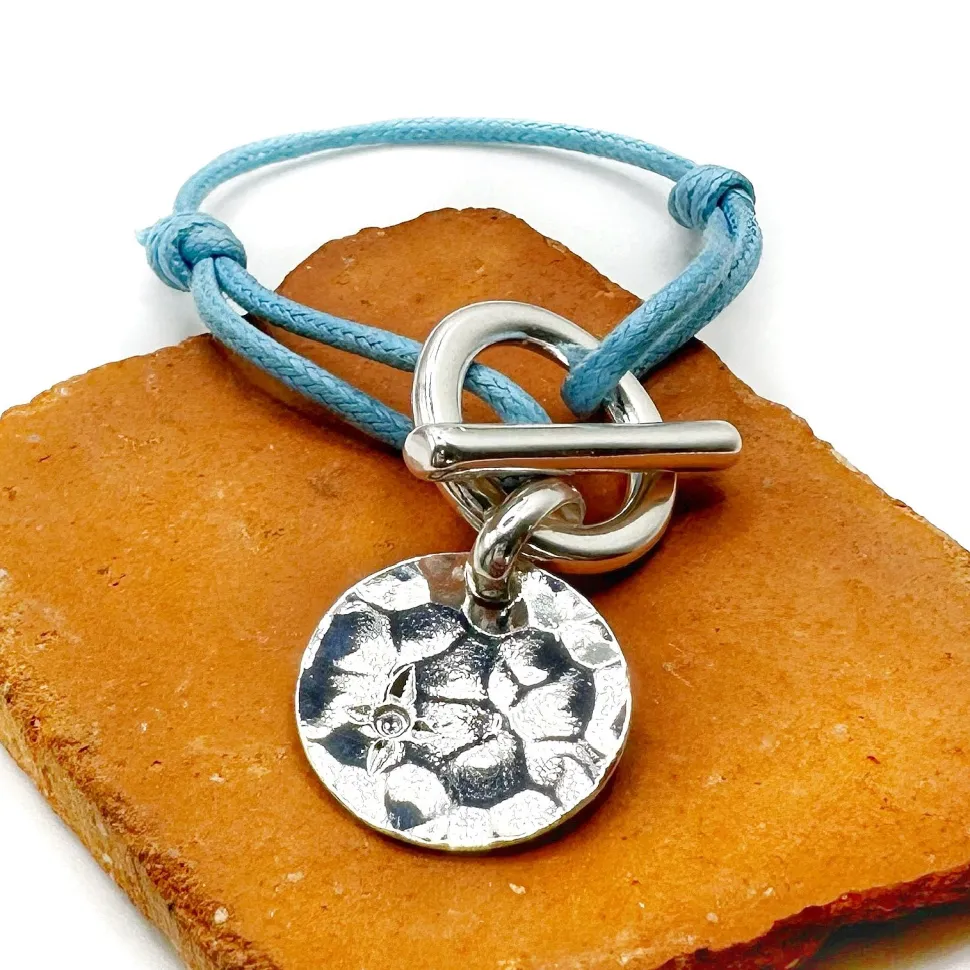 bracelet_attache_medaille_0.webp Musardise Bracelet Attache Medaille Martelee Strass< Bracelets