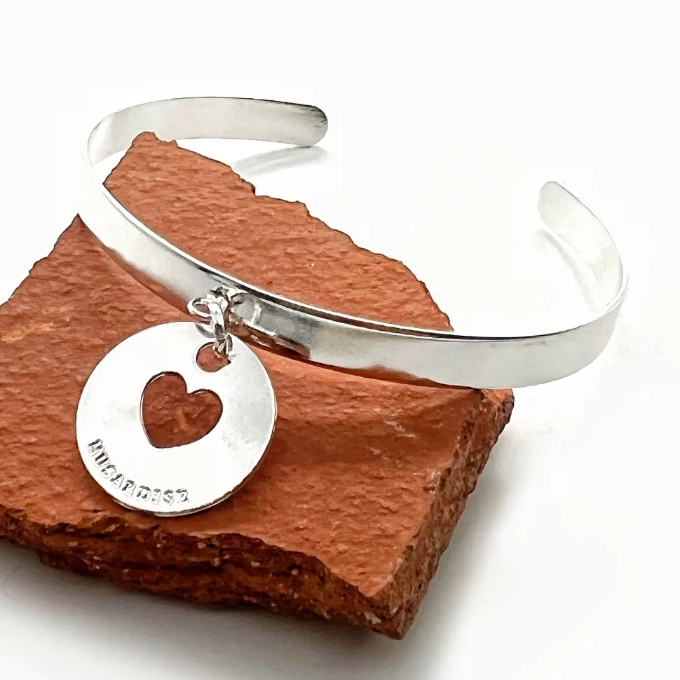 demi_jonc_coeur_0.webp Musardise Demi Jonc Coeur< Bracelets